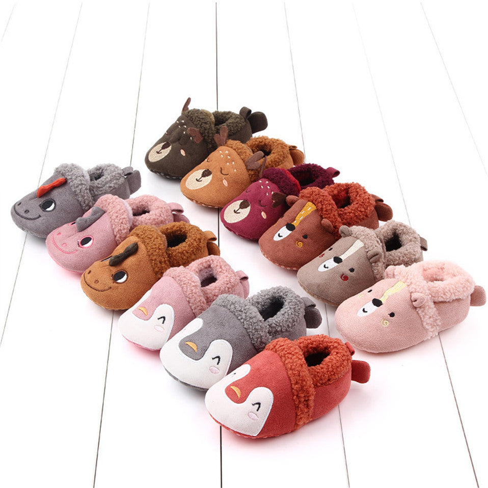 Pink penguin baby slippers for newborns and infants, anti-slip first walker shoes from August + Willow, ideal for 0-6 months.