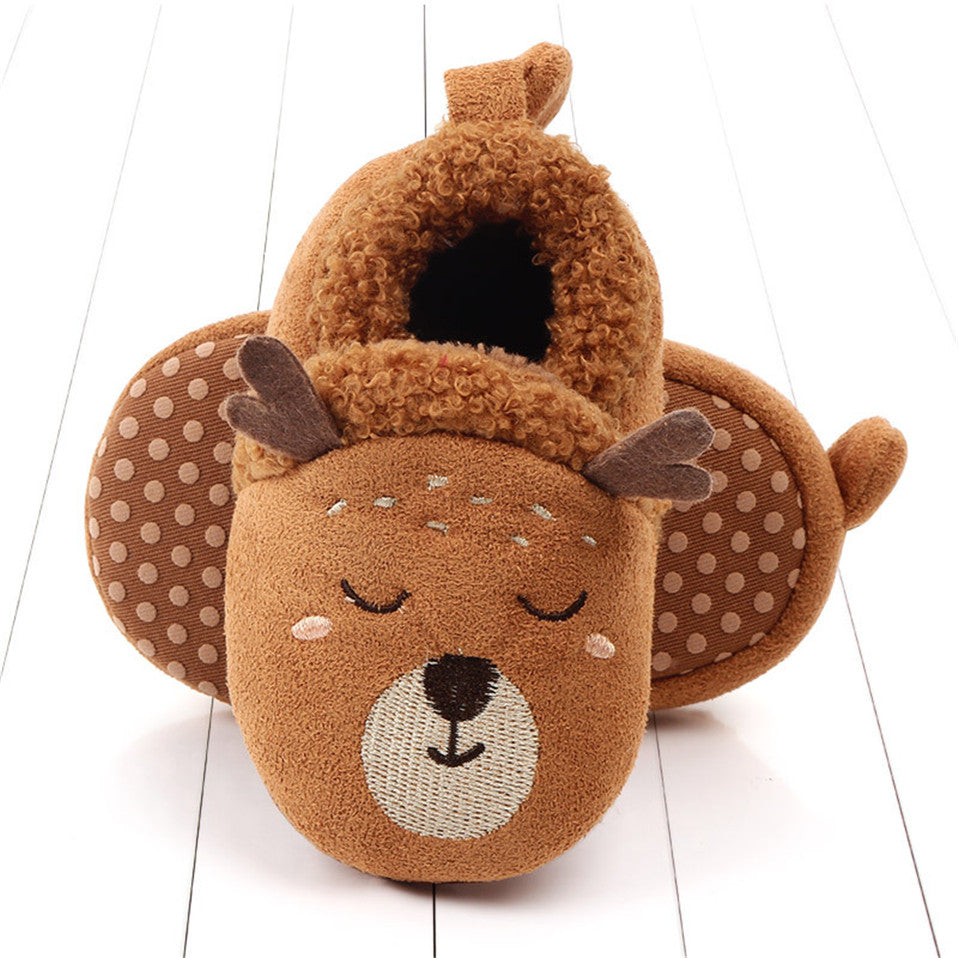Pink penguin baby slippers by August + Willow, anti-slip first walker shoes for newborns and infants, featuring animal design.