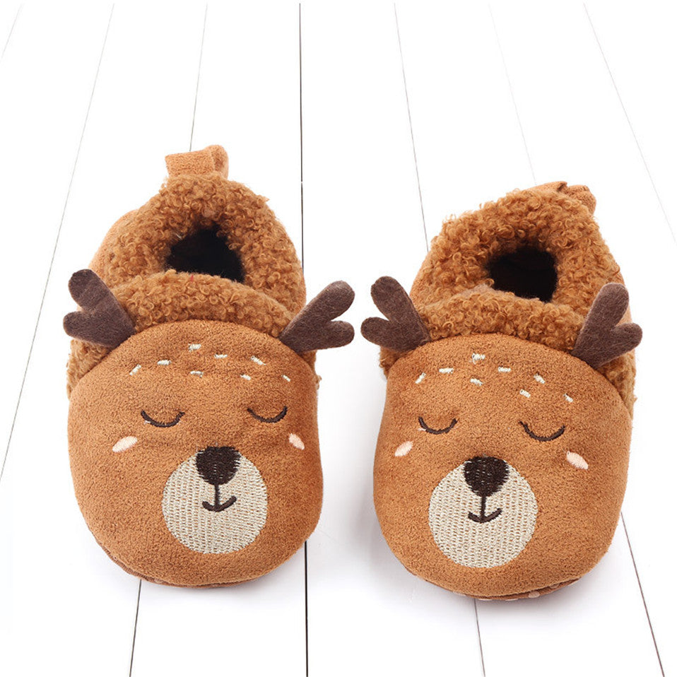 Pink animal slippers for newborns by August + Willow, featuring anti-slip soles and cute penguin design for first walkers.