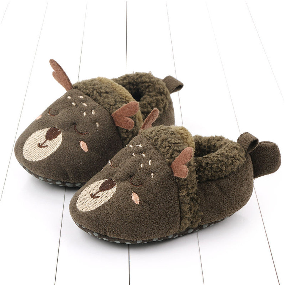 Pink animal slippers for newborns by August + Willow, featuring anti-slip soles and adorable penguin design for first walkers.