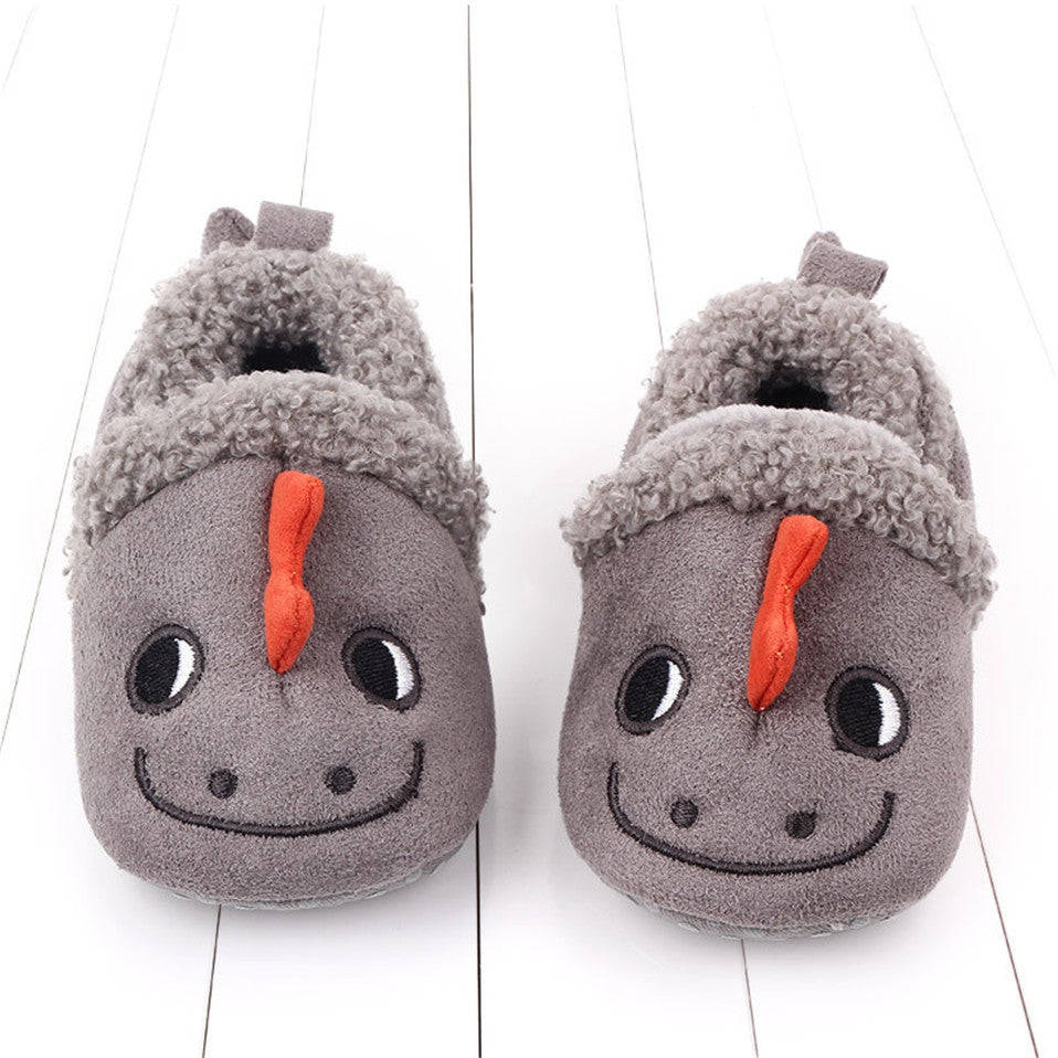 Pink penguin baby slippers for newborns and infants, anti-slip animal slippers by August + Willow, perfect for first walkers.