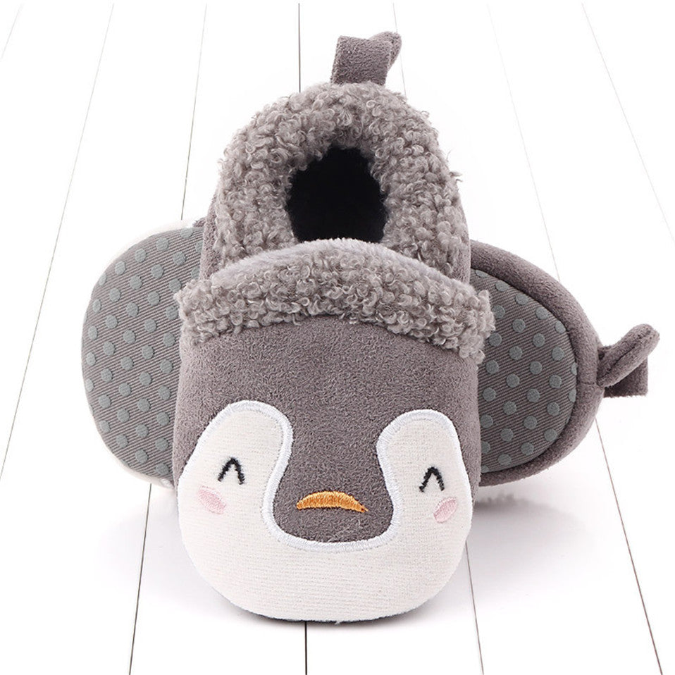 Pink penguin baby shoes for newborns and infants, anti-slip animal slippers by August + Willow, designed for first walkers.