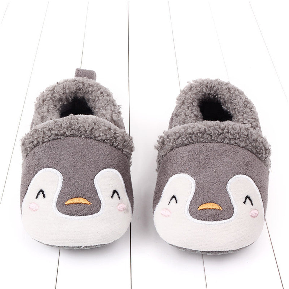 Pink penguin baby shoes for infants, anti-slip first walker animal slippers for newborns and toddlers, by August + Willow.