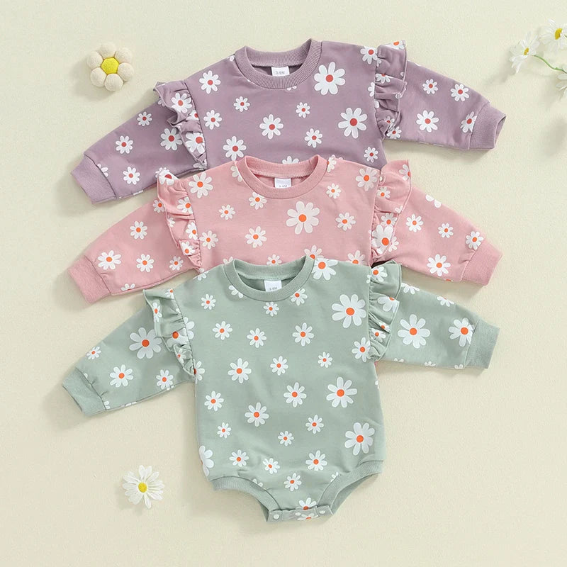 Baby girl bubble romper by August + Willow featuring daisy flower print, long sleeves, round neck, in purple for 6-12 months.