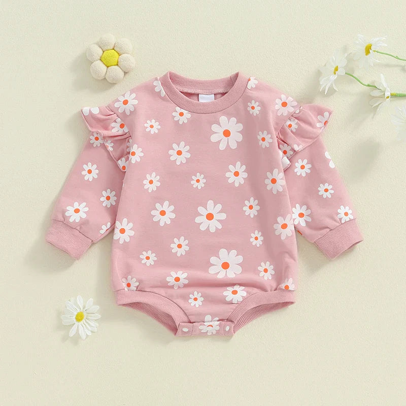 Baby girl bubble romper by August + Willow with daisy flower print, long sleeves, round neck, suitable for 6-12 months.
