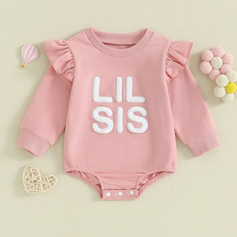 Baby and toddler girls matching big sister and little sister ruffle sleeve long-sleeve rompers by August + Willow.