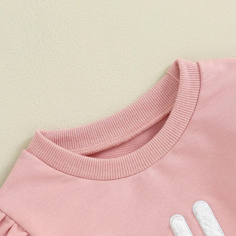 Baby and toddler girls matching ruffle sleeve long sleeve romper with crewneck top, by August + Willow, for sisters aged 6-12 months.