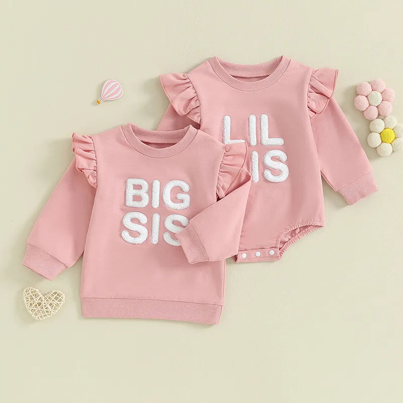 Baby girl matching romper by August + Willow with ruffle long sleeves, crewneck, perfect for sisters' coordinated outfits.