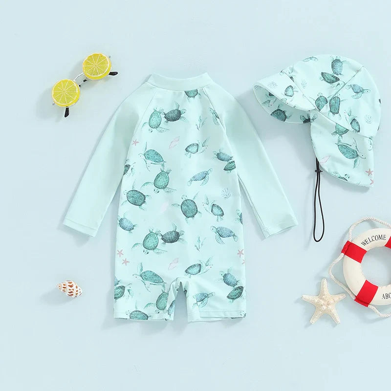 Baby toddler boy 2-piece swimsuit set with dinosaur, turtle, whale print, long sleeves, sun hat, by August + Willow.