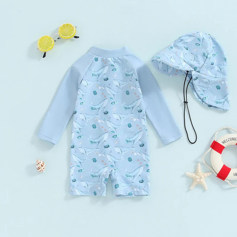 Baby toddler boy 2-piece swimwear set with dinosaur, turtle, and whale print, long sleeve swimsuit and sun hat from August + Willow.