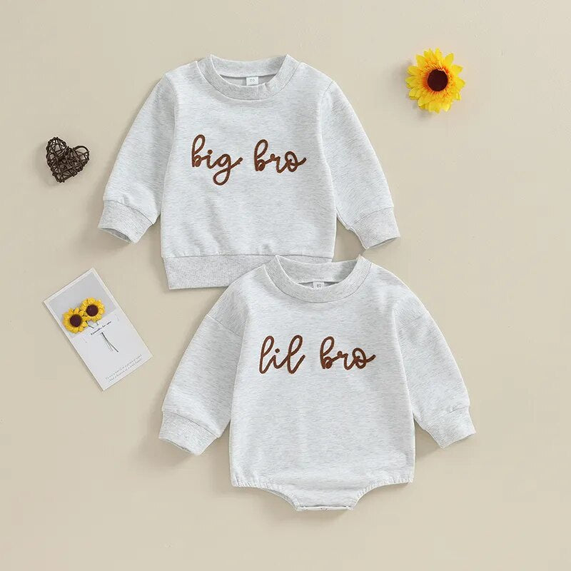 Baby boy long sleeve crewneck top with "Big Lil Bro" letters from August + Willow, featuring a cozy romper for toddlers.