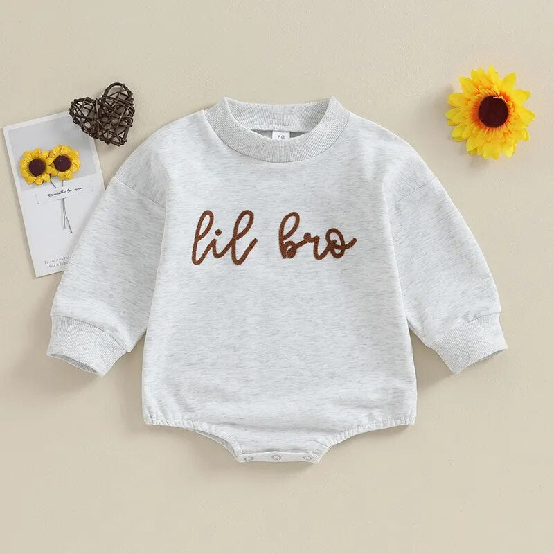 Toddler baby boy long sleeve crewneck top with "Big Lil Bro" letters, matching romper by August + Willow, perfect for brother outfits.