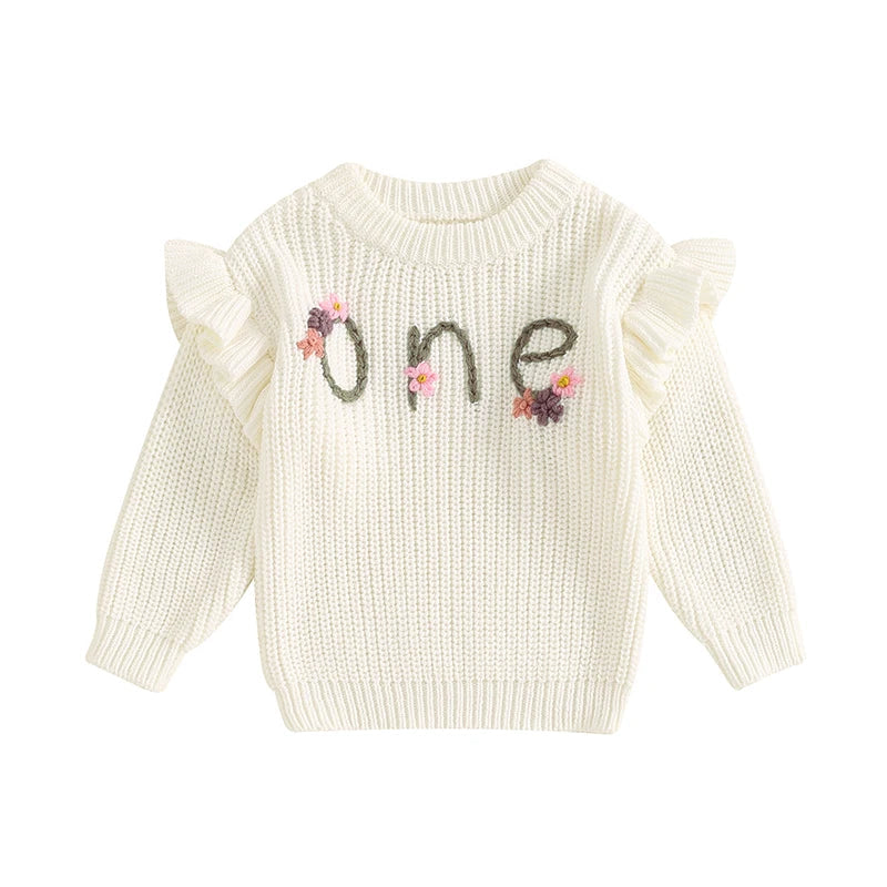 Baby girl birthday sweater by August + Willow featuring floral embroidery, letter details, long sleeves, knitted warm knitwear top.