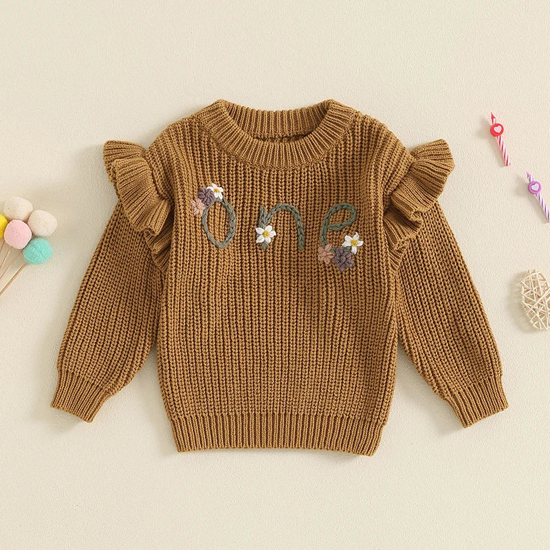 Baby girl birthday sweater by August + Willow featuring floral embroidery, long sleeves, and cozy knitted fabric for infants 12-18 months.