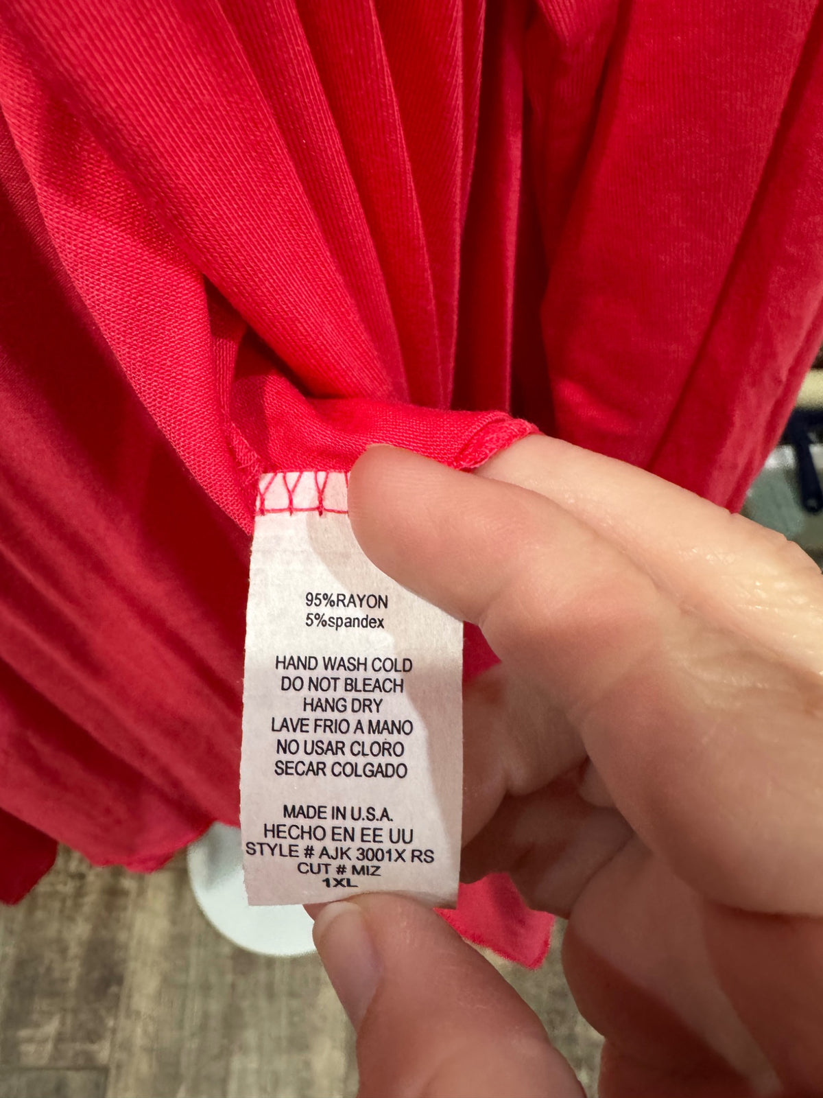 Azules bright pink cardigan fabric and care label