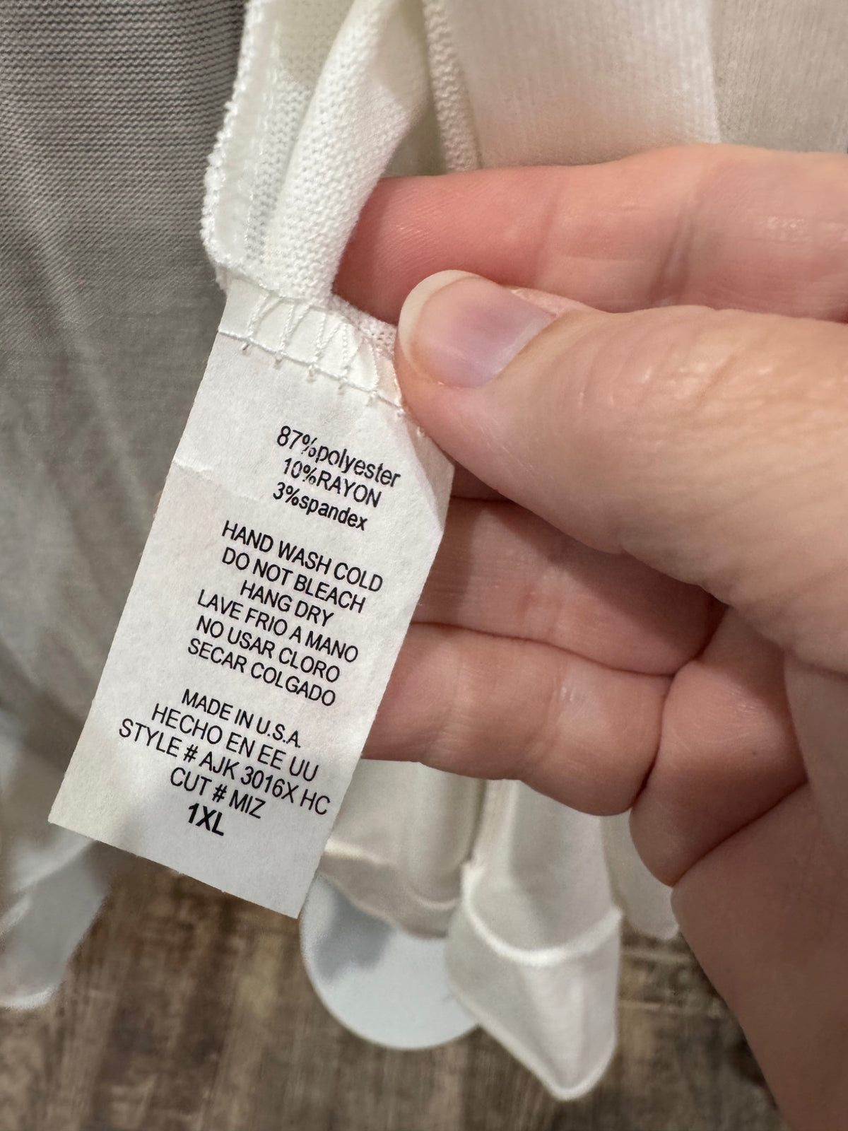 Azules white cardigan fabric and care label