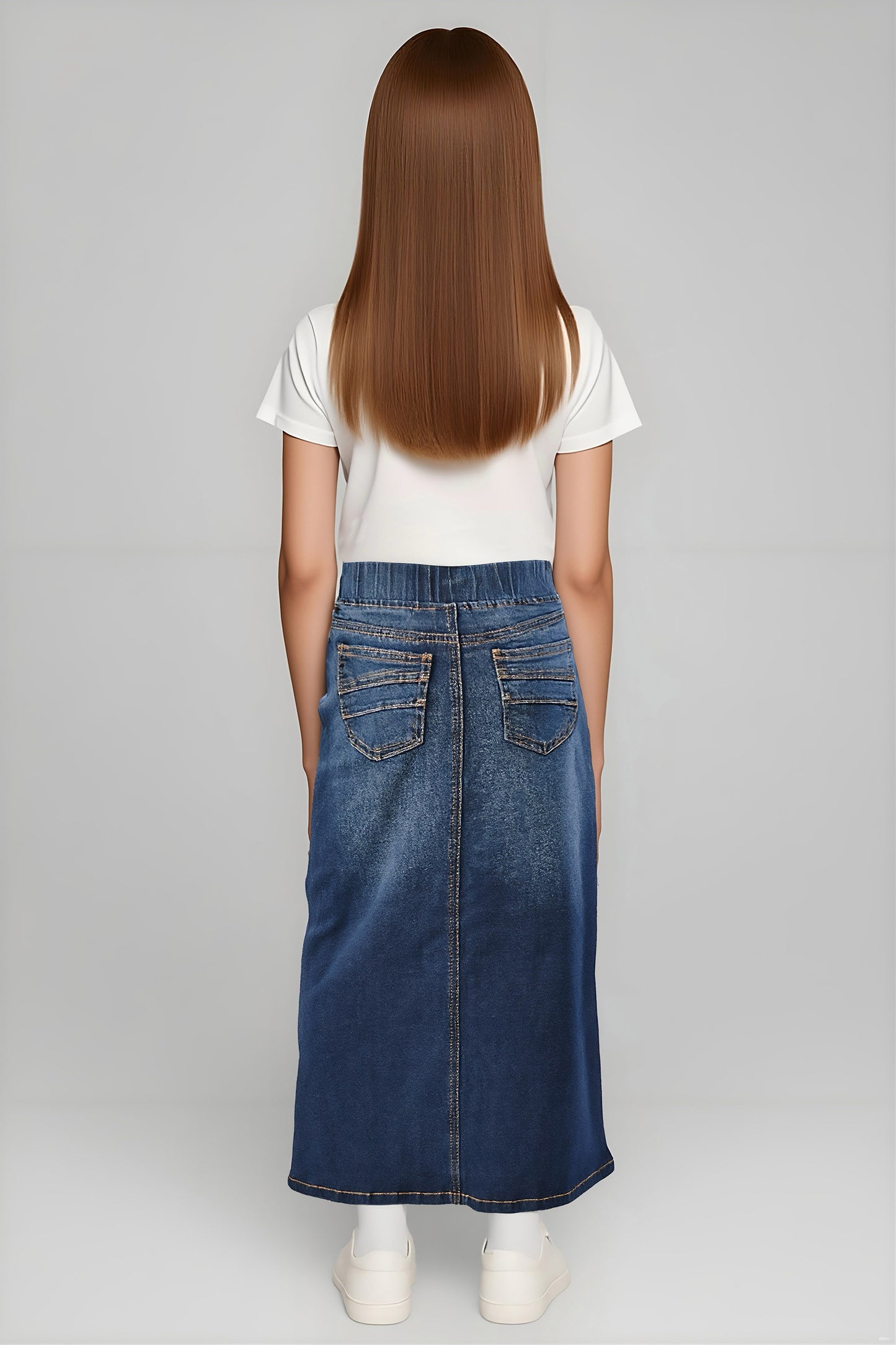 Girls denim maxi skirt with elastic waistband in dark wash by Be-Girl, featuring a flowing design and casual style.