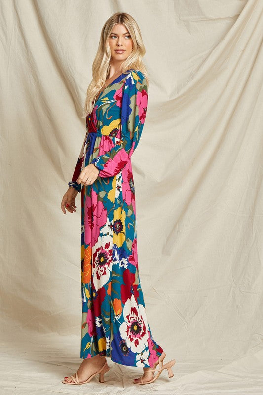 Pink floral faux wrap surplice maxi dress by Beeson River, featuring a flowing silhouette and elegant floral pattern.