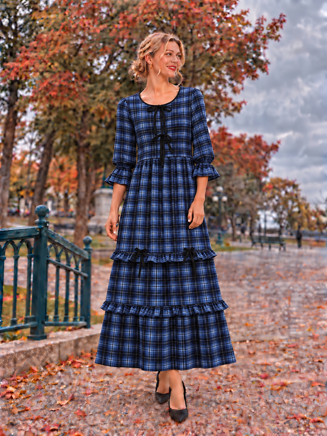 Blue plaid tiered maxi dress with black ribbon bows, ruffle cuffs and tiered skirt