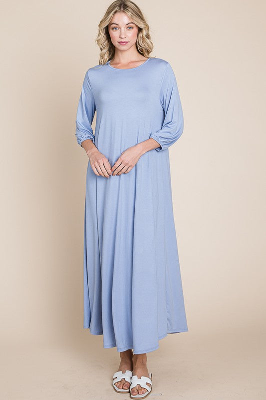 Bombom A-line puff sleeve maxi dress in cloud blue, showcasing a flowy silhouette and elegant design.
