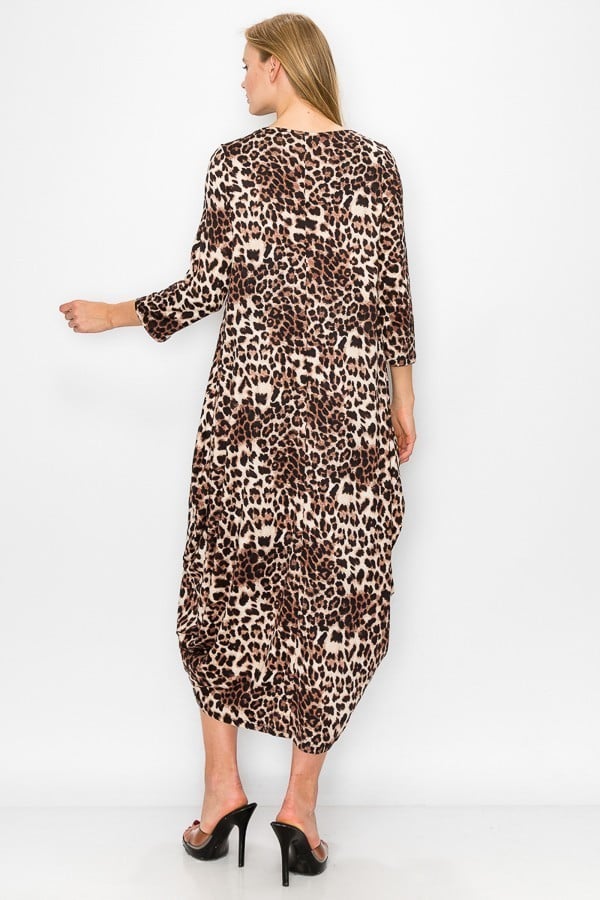Leopard women's maxi dress with side pouch pockets by Casa Lee, featuring a flowing silhouette and stylish animal print.