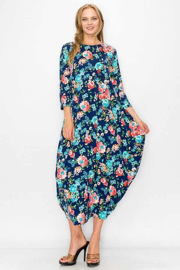 Navy pink floral women's bubble maxi dress with pockets by Casa Lee, featuring a flowy silhouette and vibrant floral pattern.