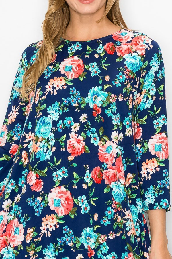 Navy pink floral women's bubble maxi dress with pockets by Casa Lee, featuring a flowy silhouette and vibrant floral pattern.