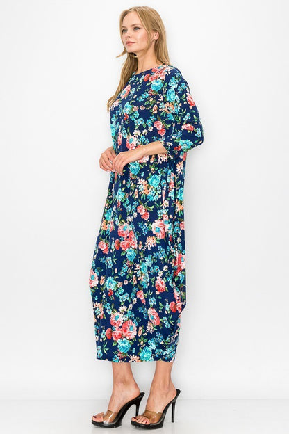 Navy pink floral women's bubble maxi dress with pockets by Casa Lee, featuring a flowy silhouette and vibrant floral pattern.