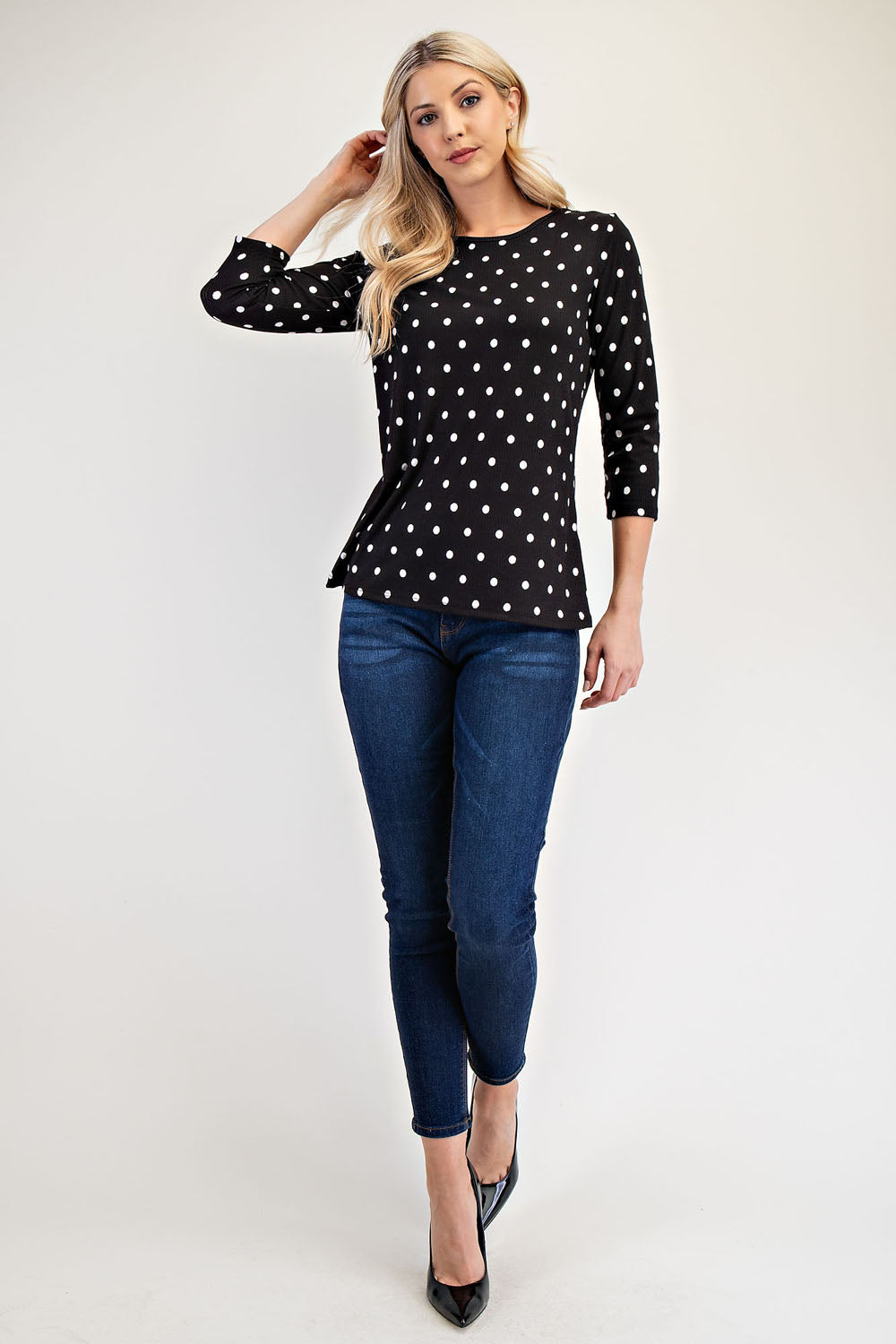 Black polka dot layering top by Celeste Clothing, 3/4 sleeve shirt featuring a stylish layered design for missy regular sizes.