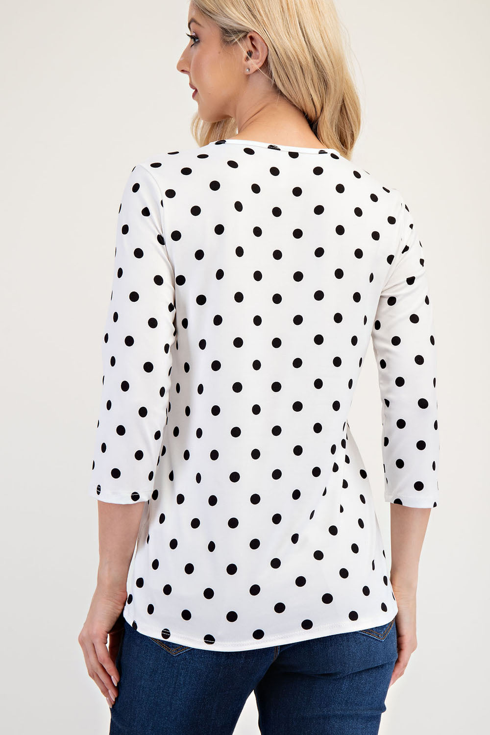 Black polka dot layering top by Celeste Clothing, 3/4 sleeve shirt with a relaxed fit for Missy regular sizes.