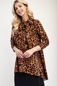 Leopard print Celeste Clothing A-line modest top with 3/4 sleeves and bow tie detail, stylish and comfortable for everyday wear.