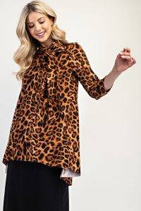 Leopard print Celeste Clothing A-line modest top with 3/4 sleeves and bow-tie detail, stylish and comfortable for everyday wear.
