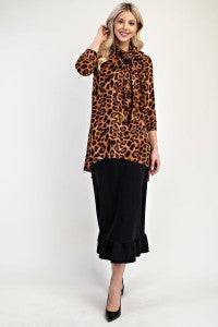 Leopard print A-line modest top with bow tie detail and 3/4 sleeves by Celeste Clothing, featuring a stylish, comfortable fit.