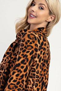 Leopard print bow-tie A-line modest top with 3/4 sleeves by Celeste Clothing, stylish and comfortable for everyday wear.