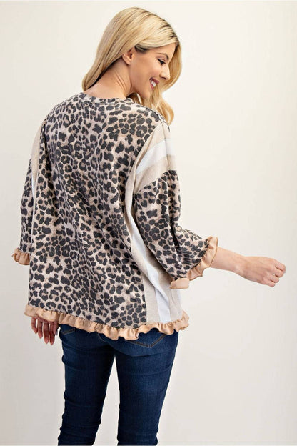 Neutral leopard print 3/4 sleeve ruffle trim top by Celeste Clothing, featuring a stylish, feminine design.