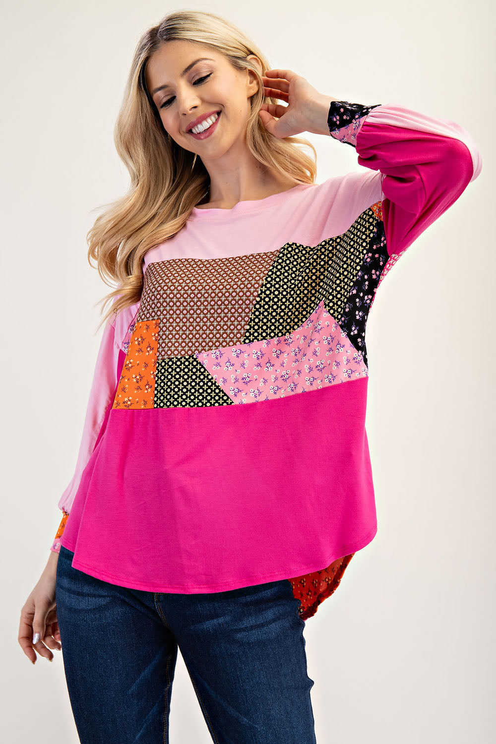 Pink colorblock patchwork 3/4 sleeve top by Celeste Clothing, featuring a stylish design and comfortable fit.