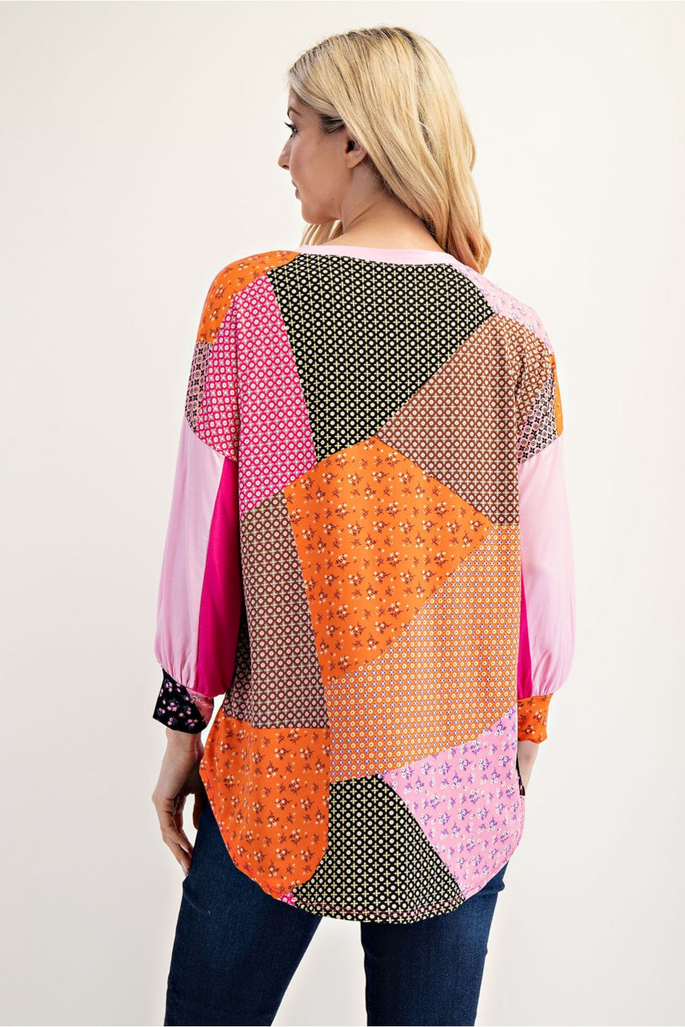 Pink colorblock patchwork 3/4 sleeve top by Celeste Clothing, featuring a stylish design and comfortable fit.