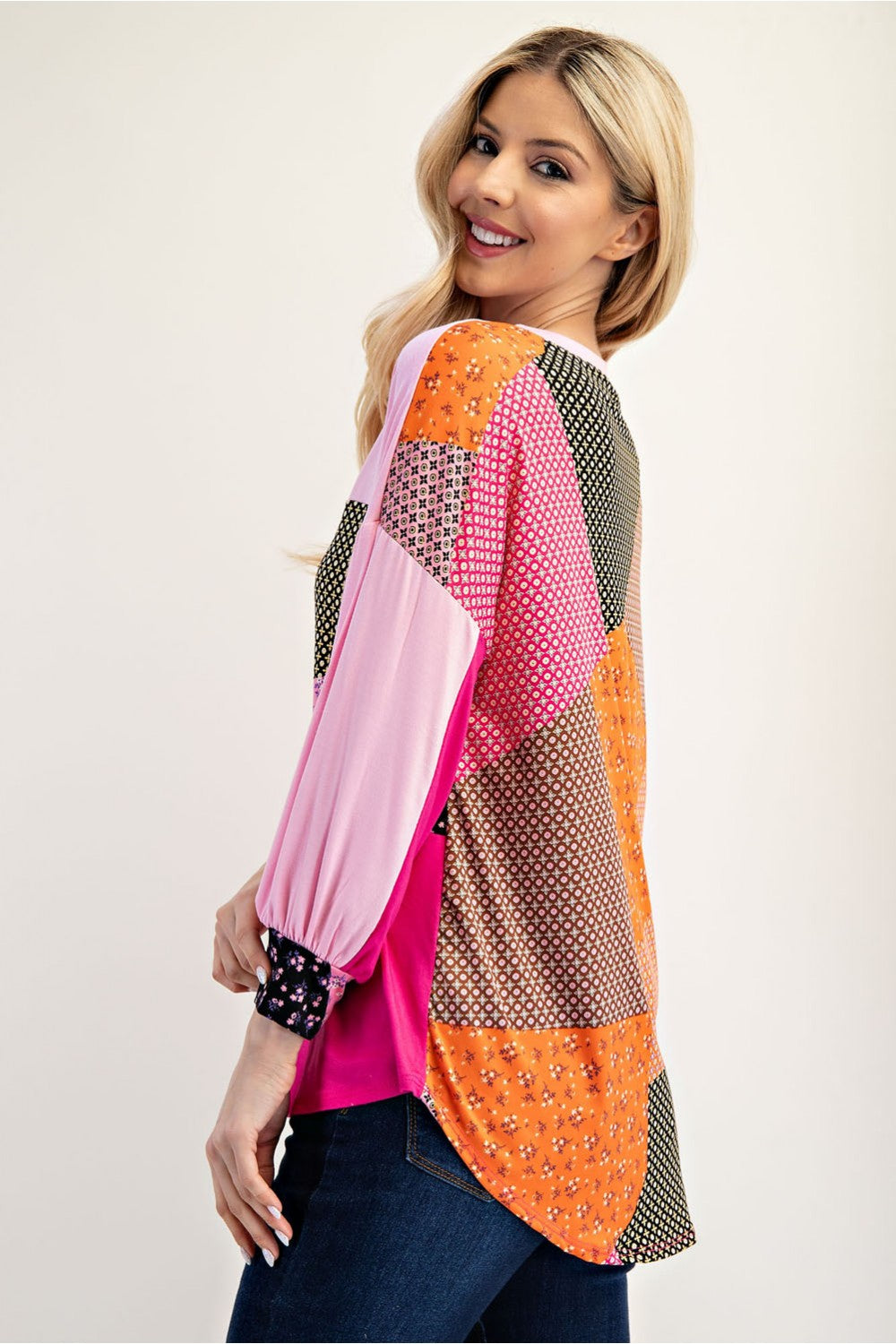 Pink colorblock patchwork 3/4 sleeve top by Celeste Clothing, featuring a stylish design and comfortable fit.