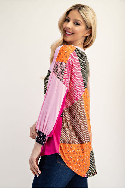 Pink colorblock patchwork 3/4 sleeve top by Celeste Clothing, featuring a stylish design and comfortable fit.