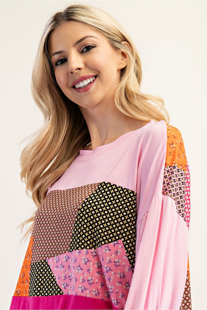 Pink patchwork colorblock 3/4 sleeve top by Celeste Clothing, showcasing a stylish and vibrant casual top.