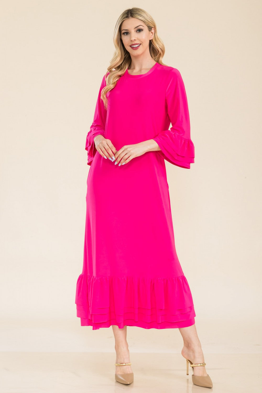 Pink plus-size modest 3/4 sleeve dress with ruffle bell sleeves from Celeste Clothing, featuring a stylish and comfortable design.