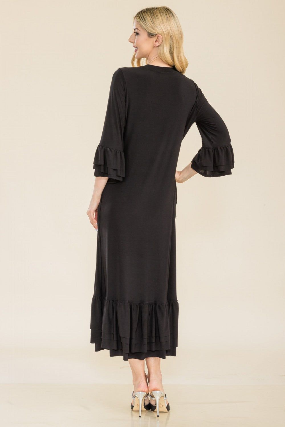 Plus size pink modest 3/4 sleeve dress with ruffle bell sleeves from Celeste Clothing, featuring a stylish and comfortable design.