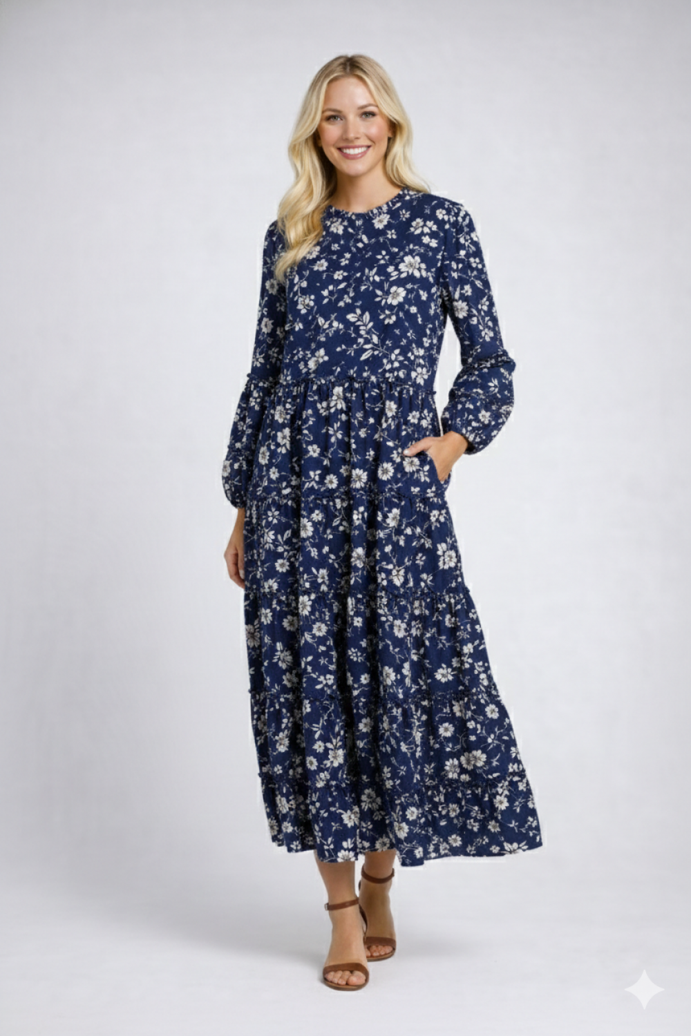 Mauve modest floral tiered dress with pockets by Celeste Clothing, perfect for all occasions, featuring a flattering fit and flowing design.