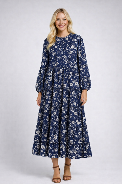Celeste Clothing mauve modest floral tiered dress with pockets, featuring long sleeves and a flowing silhouette for versatile occasions.