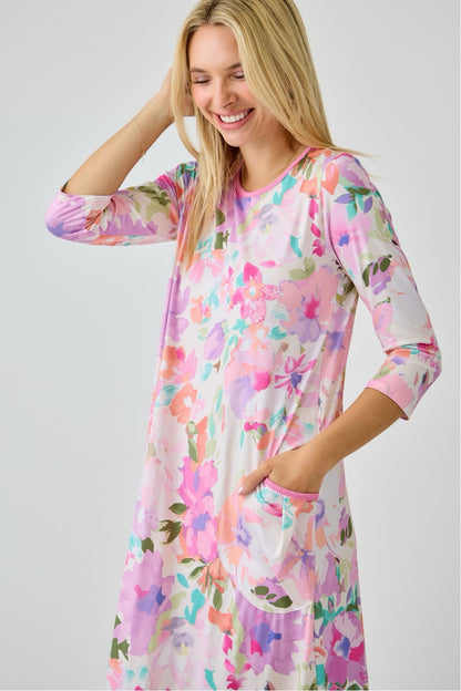 Navy watercolor floral tiered ruffle dress with pockets from Celeste Clothing, featuring summer floral print and feminine ruffle details.