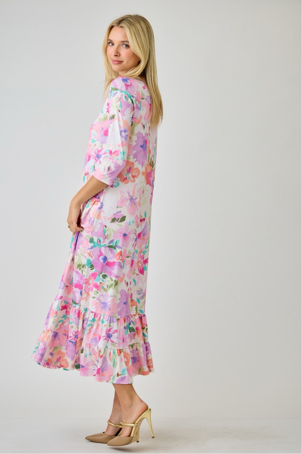 Celeste Clothing watercolor summer floral tiered ruffle dress with pockets, navy floral pattern, lightweight and feminine design.