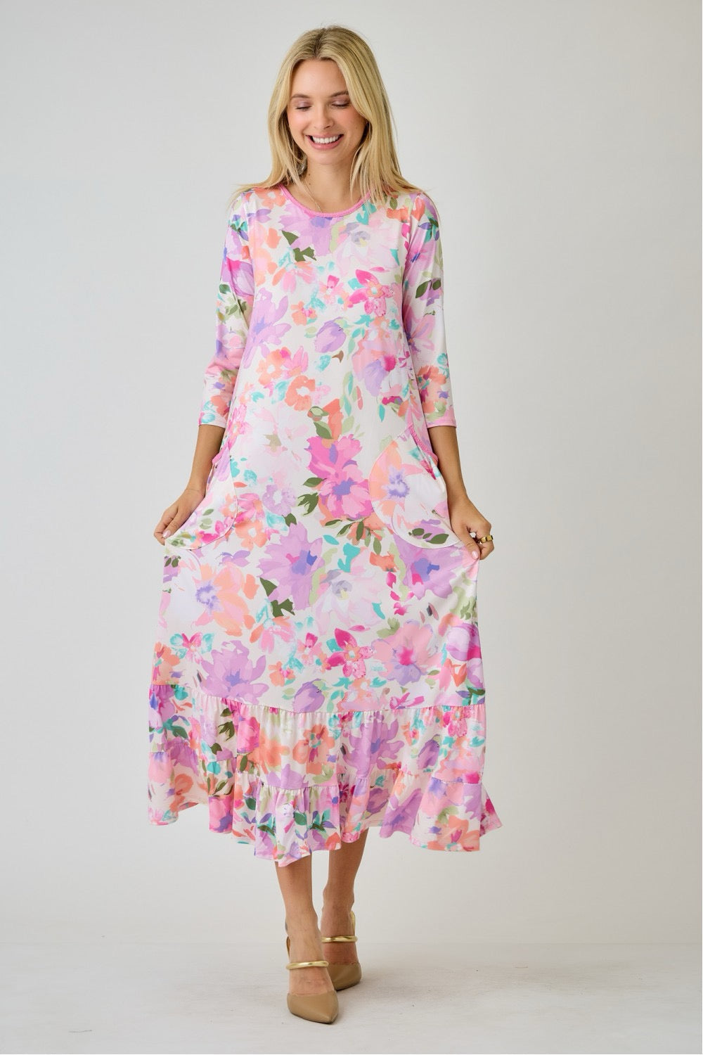 Navy watercolor floral tiered ruffle dress with pockets from Celeste Clothing, perfect for summer, featuring a feminine, flowy design.