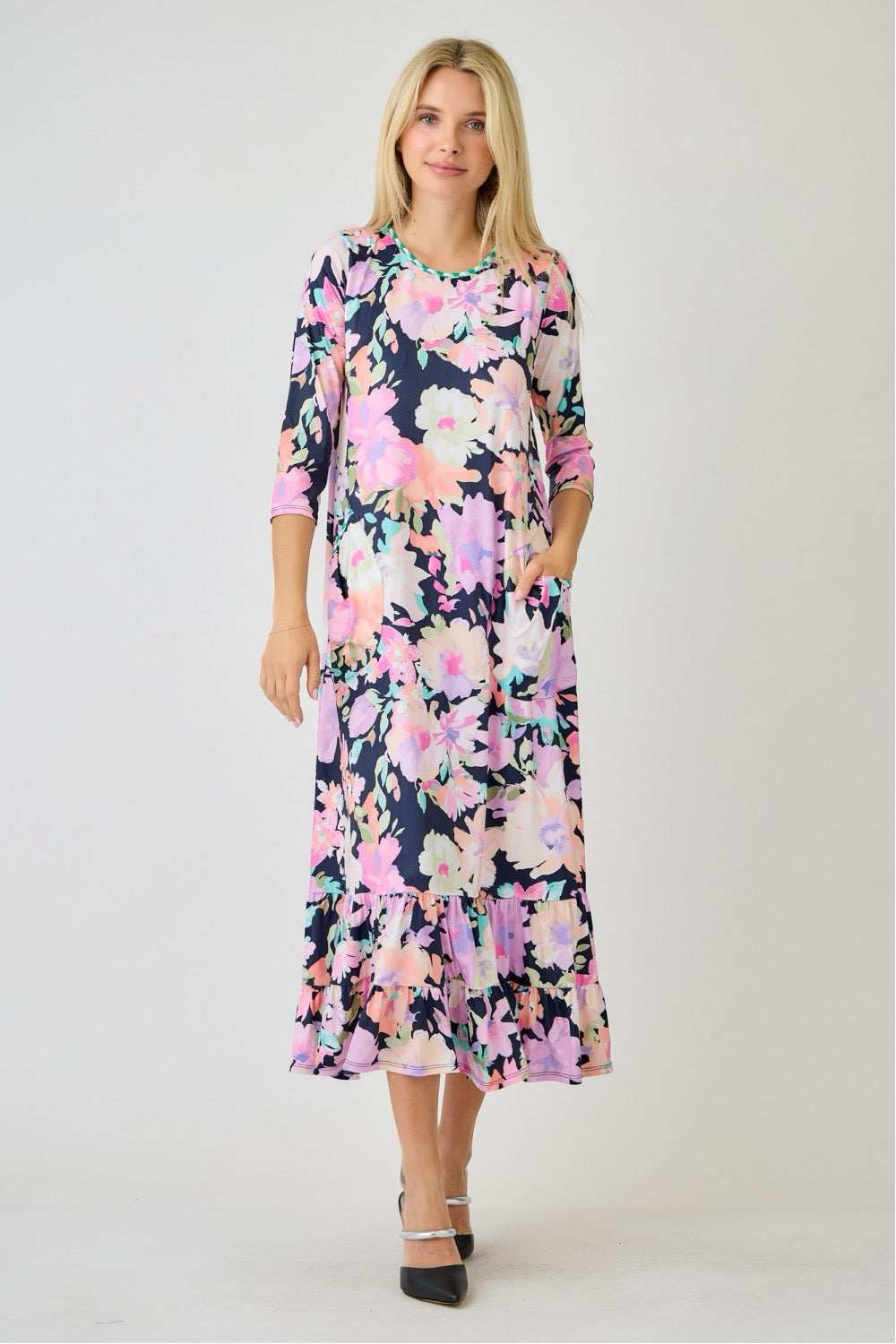 Navy watercolor floral tiered ruffle dress with pockets by Celeste Clothing, featuring a summer floral design and feminine style.