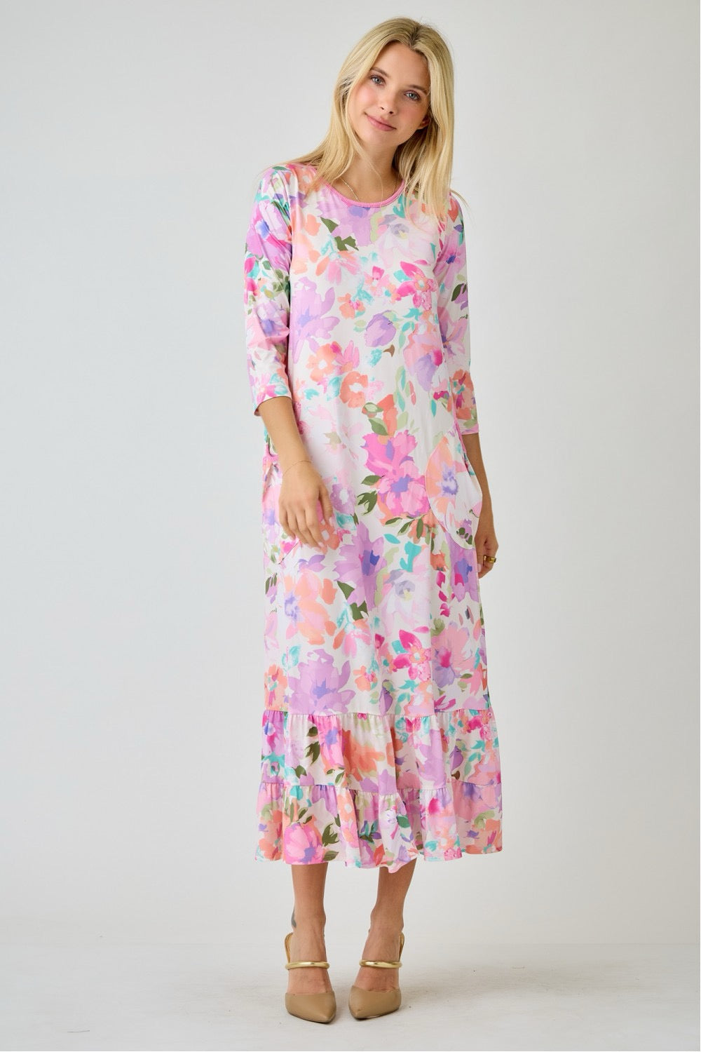 Navy watercolor floral tiered ruffle dress with pockets by Celeste Clothing, styled with a flowy summer design.