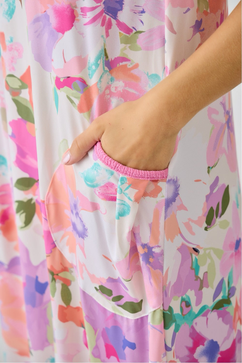 Navy watercolor floral tiered ruffle dress with pockets from Celeste Clothing, perfect for summer, featuring a flowy silhouette and floral print.